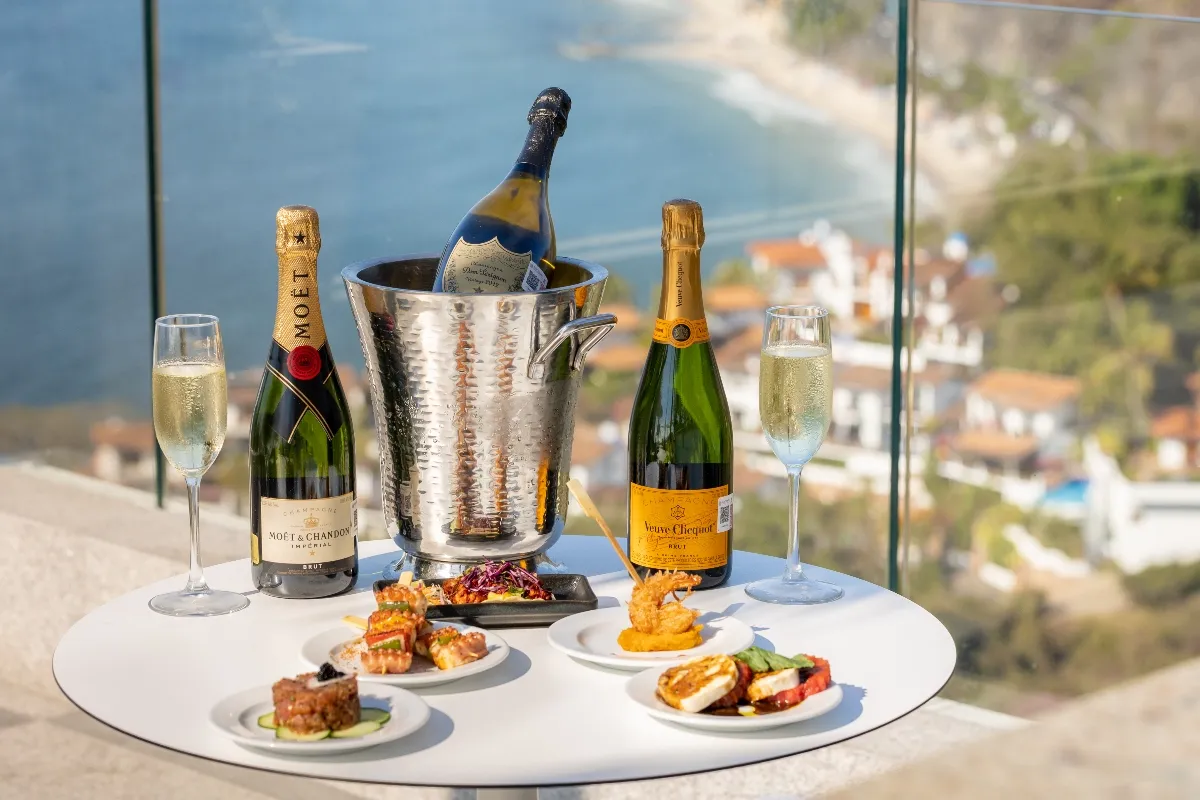 champagne and seafood at mousai pv rooftop restaurant