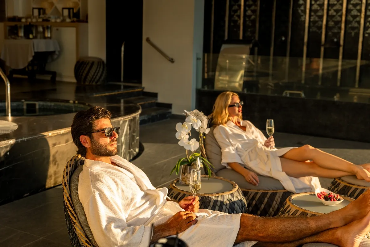 couple watching sunset from the hotel mousai puerto vallarta spa imagine